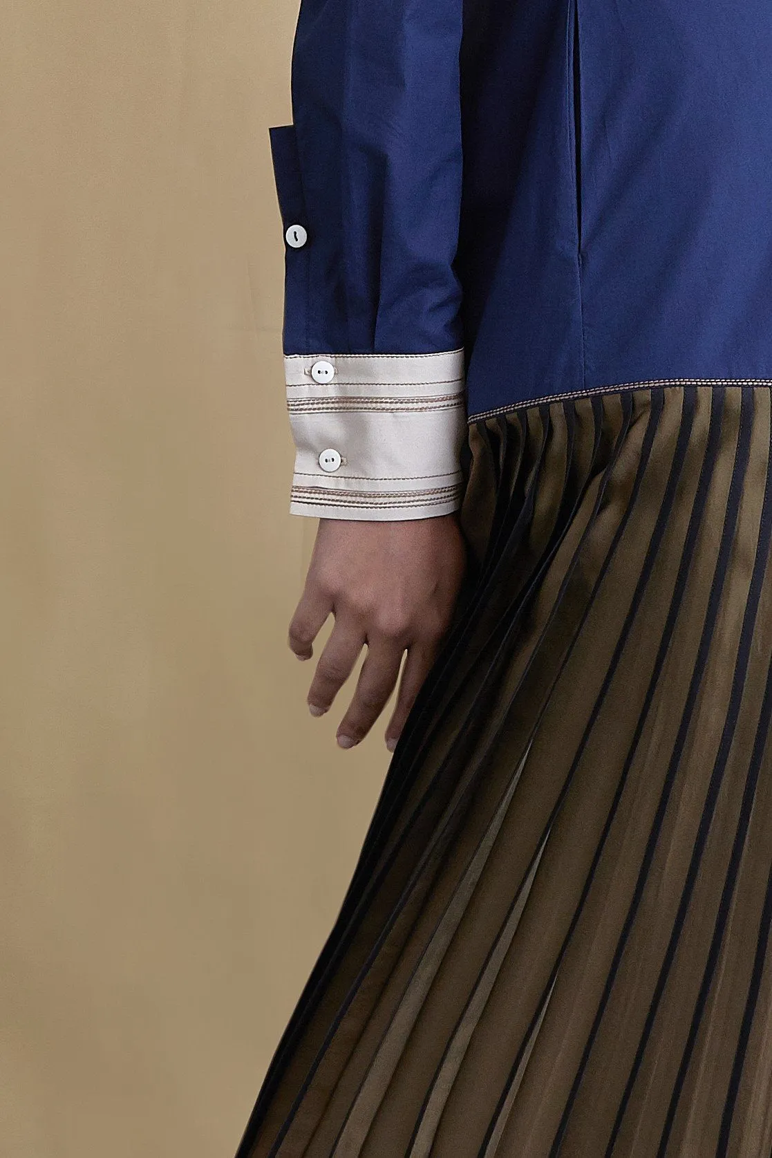 Colour-block dress with side pleating